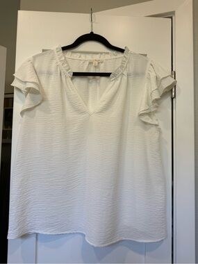 nine britton Cream V-Neck Ruffle Sleeve Blouse